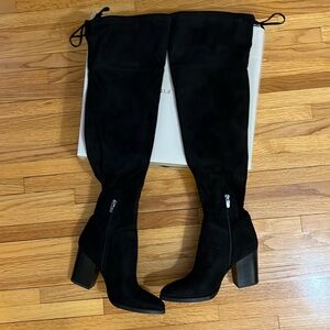 Tall thigh high boots